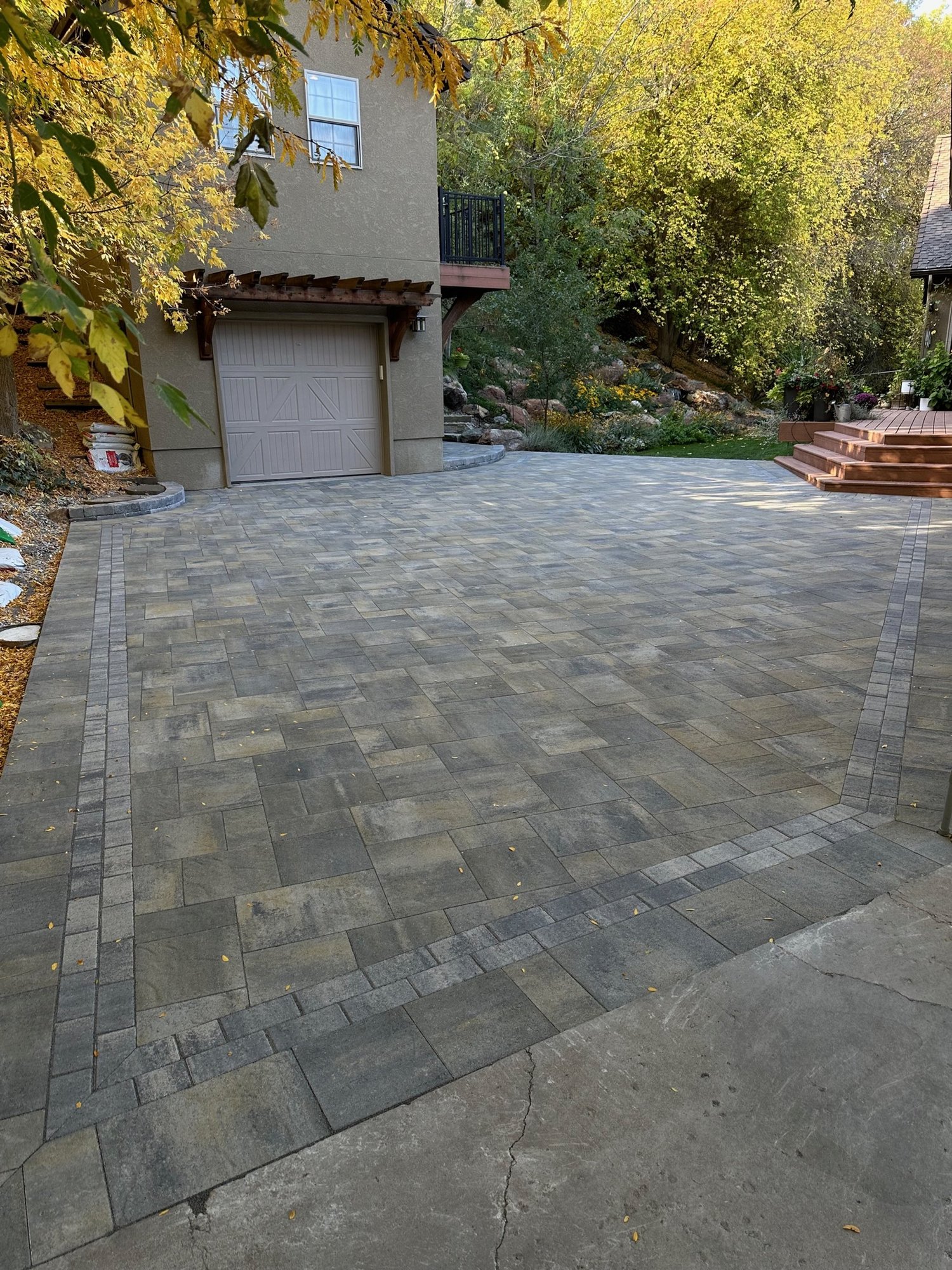 Completed landscape project with stone paving